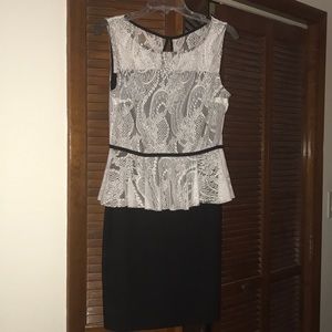 Sleeveless peplum lace top dress.